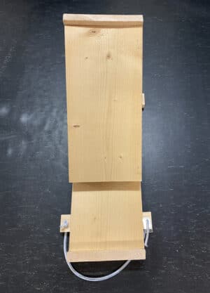 fladdermusholk framifrån med spännremmar